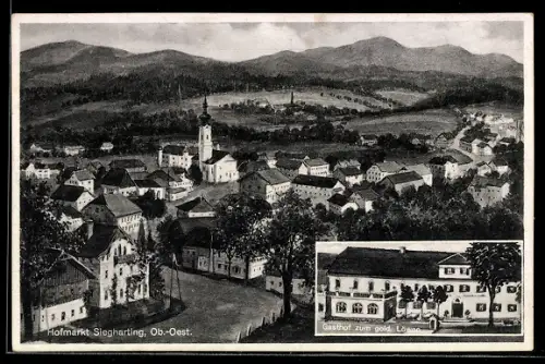 AK Sigharting /Ob. Öst., Gasthof zum goldenen Löwen F. Gahbauer, Totalansicht mit Kirche