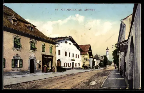 AK St. Georgen am Attersee, Ortsstrasse mit Häusern und Kirche