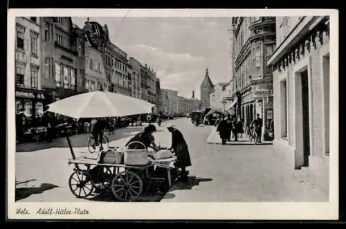 AK Wels, Platz, Marktstand und Geschäftszeile