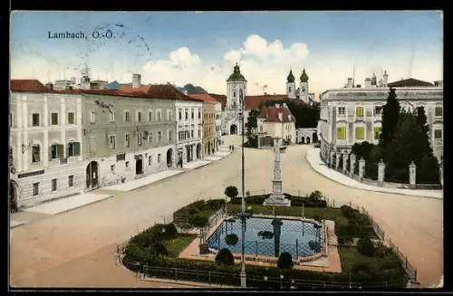 AK Lambach /O.-Ö., Platz mit Brunnen und Kirche