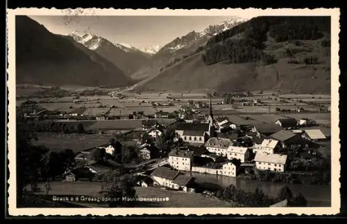AK Bruck a. d. Grossglockner Hochalpenstrasse, Panorama mit Kirche und Brücke