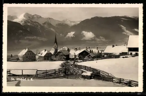 AK St. Michael i. L., Winterpanorama mit Dorf und Kirche