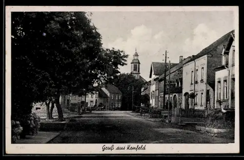 AK Konfeld, Strassenpartie mit Kirche