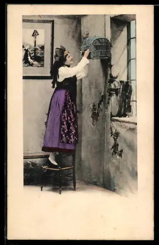 AK Elsässerin an einem Käfig, elsass-lothringische Tracht