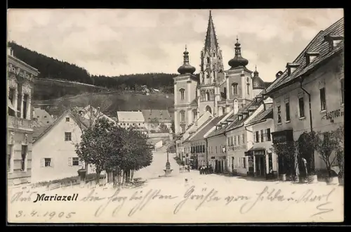 AK Mariazell, Strassenpartie mit Gasthof und Kirche