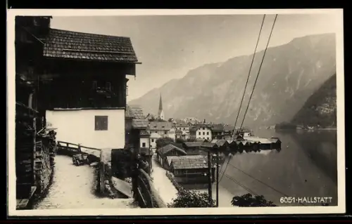 AK Hallstatt, Uferpartie mit Bootshäusern und Kirche