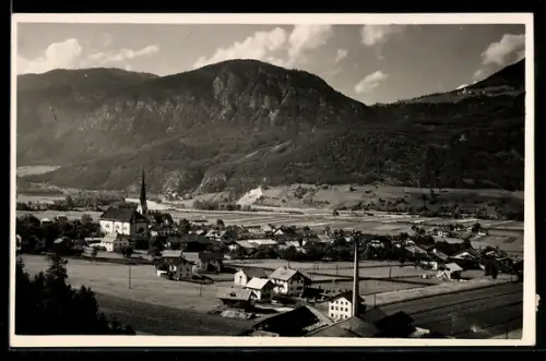AK Inzing /Oberinntal, Panorama mit Kirche und Bergen
