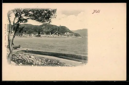 AK Noli, Vista del lungomare con alberi e barca sulla riva