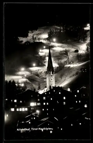AK Kitzbühel /Tirol, Ansicht der beleuchteten Skipiste bei Nacht