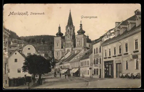 AK Mariazell /Steiermark, Grazergasse mit Gasthof zur goldenen Kanone und Gasthof zum weissen Engel