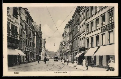 AK Trier, Simeonstrasse mit Strassenbahn, Delikatessengeschäft