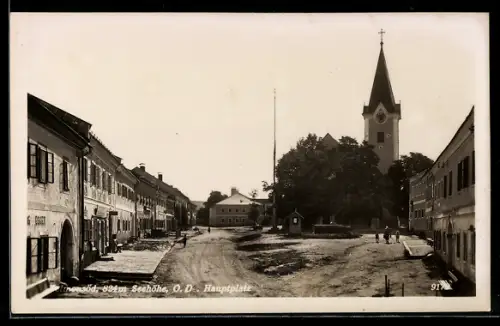 AK Hellmonsödt /O. D., Hauptplatz mit Kirche und Geschäft Egger