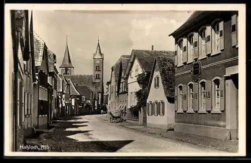 AK Hassloch /Pfalz, Strassenszene mit Kirche