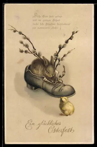 AK Osterhase sitzt in einem Schuh und schaut ein Osterküken an