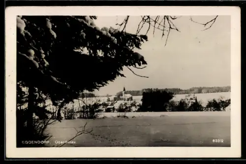 AK Eggendorf /Oberdonau, Panorama mit verschneitem Ort und Kirche