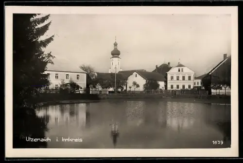 AK Utzenaich i. Innkreis, Teilansicht mit Kirche und Teich
