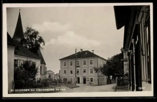 AK St. Georgen bei Obernberg, Strassenansicht mit Kirche
