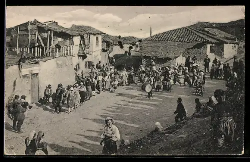 AK Tanzende Gruppe in einem Dorf