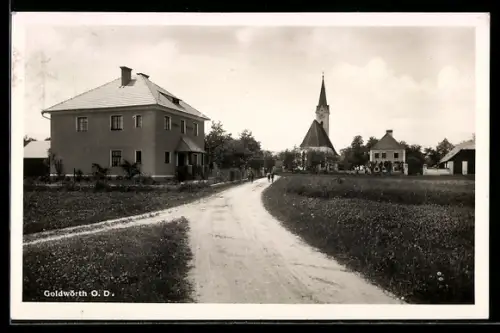 AK Goldwörth O. D., Strasse mit Volksschule u. Kirche
