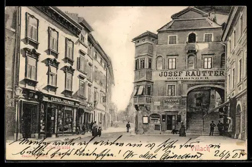 AK Villach, Schulstrasse, Partie mit Gebäude Buchbinder Josef Rautter