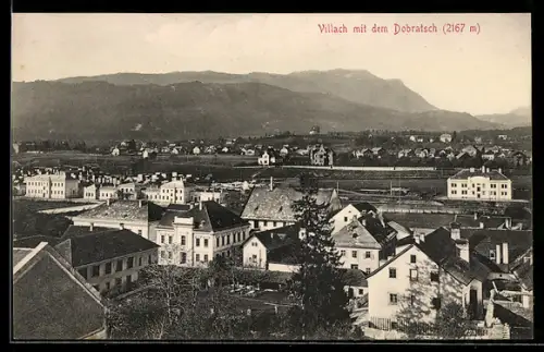 AK Villach, Blick über die Dächer der Stadt mit dem Dobratsch
