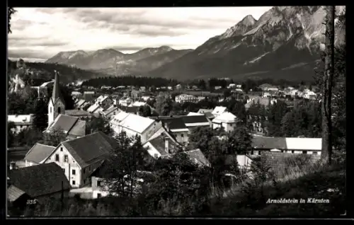 AK Arnoldstein /Kärnten, Panorama mit Kirche und Bergkulisse