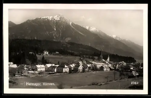 AK Hermagor /Kärnten, Ortsansicht mit Kirche und Bergpanorama
