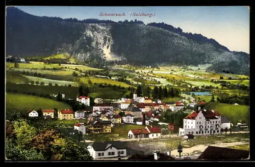 AK Schwarzach /Salzburg, Panorama mit Ort und Kirche vor Bergkulisse