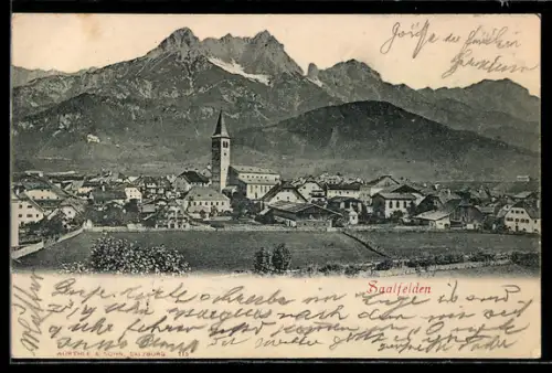 AK Saalfelden, Ortsansicht mit Kirche und Bergpanorama
