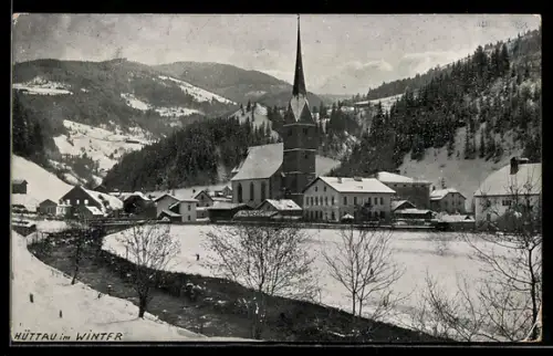 AK Hüttau, Teilansicht mit Kirche im Schnee