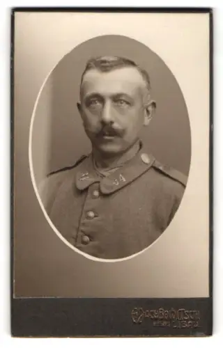 Fotografie M. Jakubowitsch, Libau, Wernowaja-ulica 34, Obergefreiter vom Bataillon 34 in Feldgrau Uniform