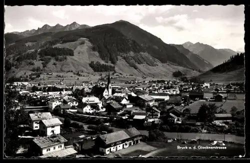 AK Bruck a. d. Glocknerstrasse, Ortsansicht mit Kirche und Bergkulisse
