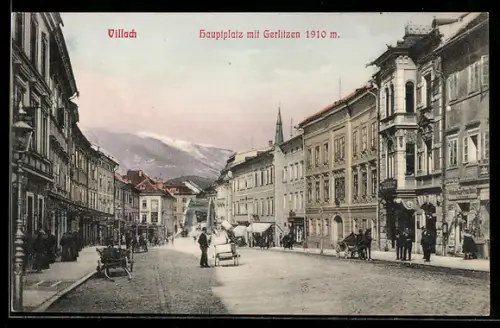 AK Villach, Hauptplatz mit Geschäft und Gerlitzen