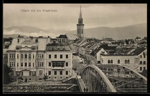AK Villach, Strassenpartie mit Kirche und Draubrücke