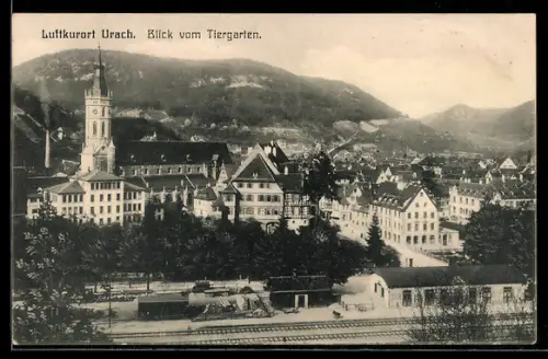 AK Urach, Bahnhof und Kirche vom Tiergarten aus