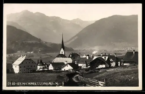 AK St. Michael i. Lungau, Dorfansicht mit Kirche und Bergen