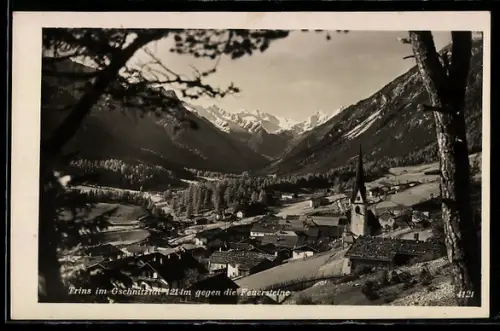 AK Trins im Gschnitztal, Panorama mit Kirche und Feuersteinen