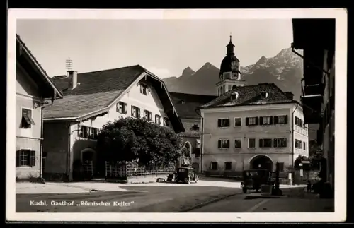 AK Kuchl, Gasthof Römischer Keller, Strassenpartie, Turmgebäude