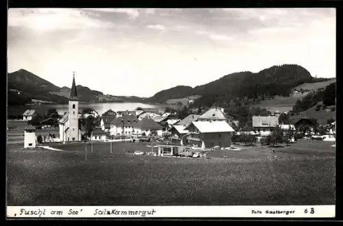 AK Fuschl am See, Ortspanorama mit Kirche und See
