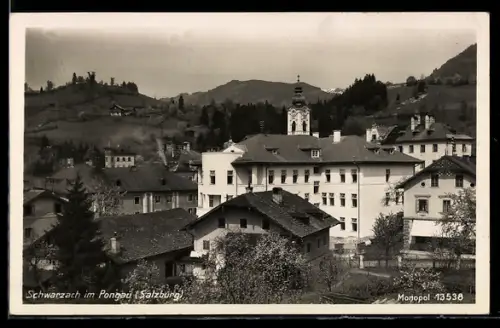 AK Schwarzach im Pongau, Panorama mit Kirche und Bergen