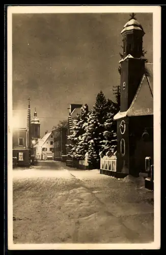 AK Dillingen /Do., Verschneite Strassenansicht mit Kirche