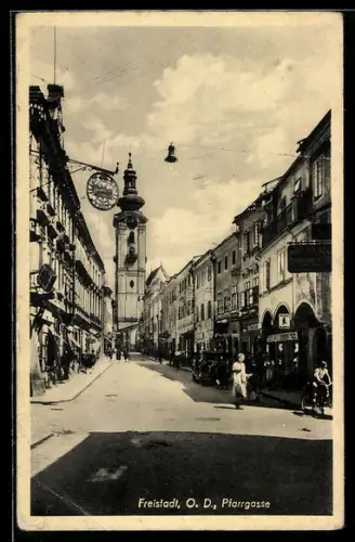 AK Freistadt /O.-D., Strasse Pfarrgasse mit Bäckerei und Kirche