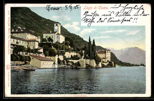 AK Lago di Como /Gravedona, Vista del lungolago con edifici storici e montagna sullo sfondo