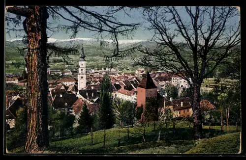 AK Wolfsberg /Kärnten, Ortsansicht mit Kirche, Stadtturm und Saualpe im Hintergrund