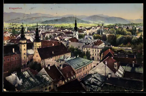 AK Klagenfurt, Stadtpanorama mit Kirchtürmen und Bergen