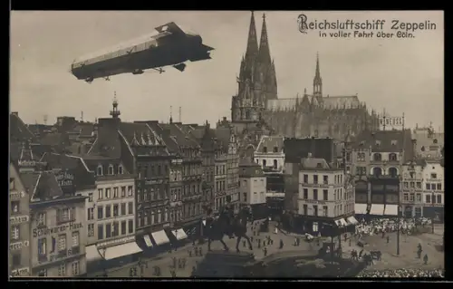 AK Cöln, Reichsluftschiff Zeppelin in voller Fahrt über der Stadt