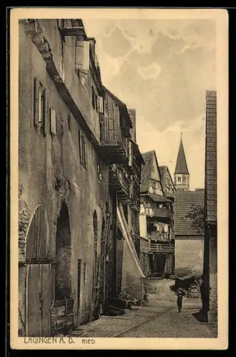 AK Lauingen a. D., Ried-Strasse mit Kirche