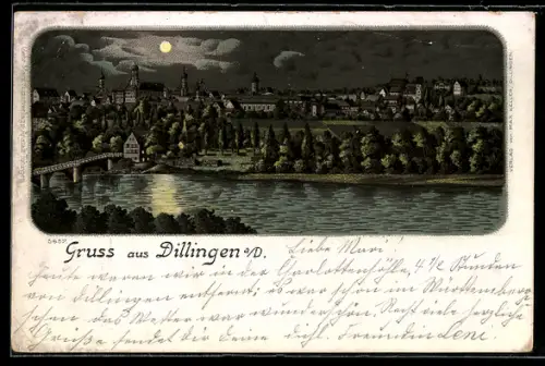 AK Dillingen, Ortsansicht hinter Wasser bei Nacht