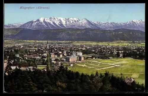 AK Klagenfurt /Kärnten, Panorama mit Stadt und dem Hochgebirge