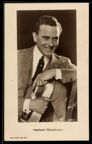 AK Schauspieler Herbert Rawlinson mit Zeitung